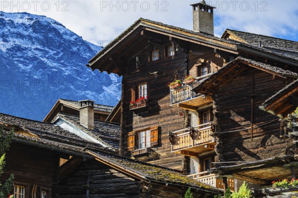 Old snow-covered wooden houses in the historic village centre, Grimentz, Val d'Anniviers, Valais Alps, Canton Valais, Switzerland, Europe