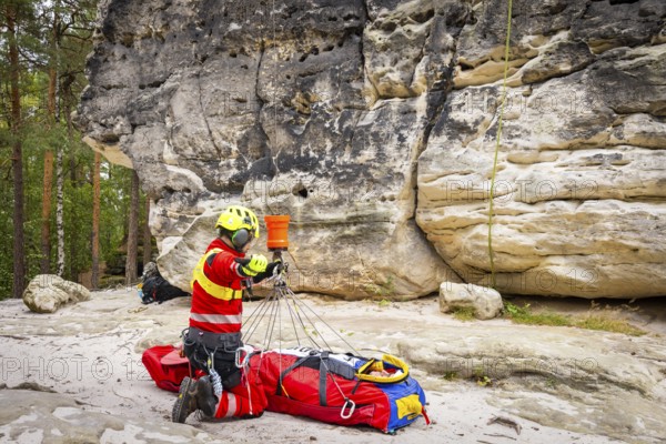 Winch rescue training of the rescue helicopter, Christoph 62, on the occasion of the 50th anniversary of the DRF Luftrettung. The rescue of casualties in the Elbe Sandstone Mountains will be practised