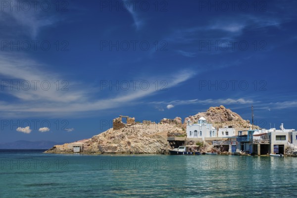 Greek village scenic picturesque view in Greece, the beach and fishing village of Firapotamos in Milos island, Greece, Europe