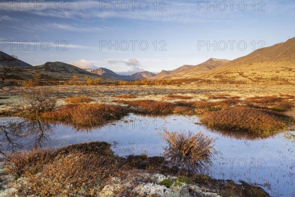 Autumn landscape in Rondane National Park, mountains, lake and tundra, Dørålen, Dørålseter, Norway, Europe