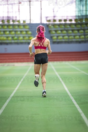 Fast athlete training in the stadium, emphasising movement and speed, Glaspalast, Sindelfingen