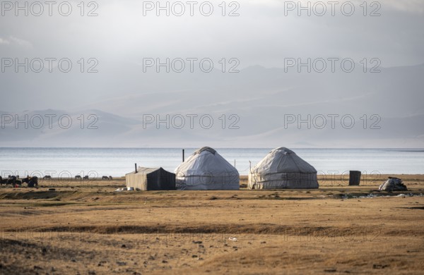 Yurts at Song Kul mountain lake in autumn, Moldo Too mountains, Naryn region, Kyrgyzstan, Asia