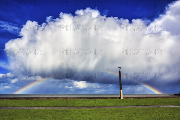 Seaside promenade, dramatic cloudy sky with rainbow, Bray, Wicklow, Ireland, Europe