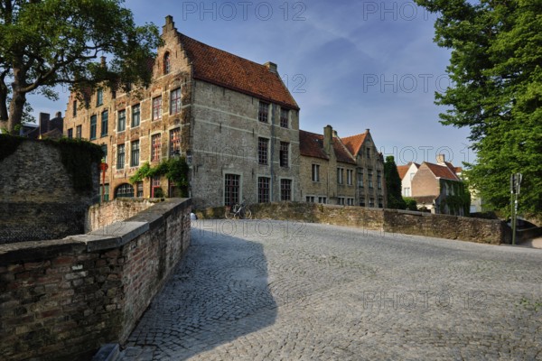 Bruges typical Belgian cityscape Europe tourism concept, canal and old houses and bridge. Brugge, Belgium, Europe