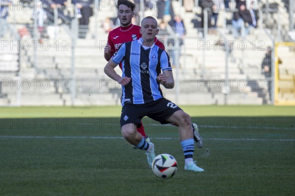Football 3rd division, 2024/25 season, matchday 22: Waldhof Mannheim v SC Verl. In the foreground: Janne Sietan (22, Mannheim)
