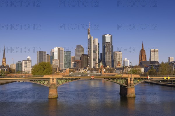 The sun shines on the skyscrapers of Frankfurt's banking skyline in the morning, Frankfurt am Main, Hesse, Germany, Europe