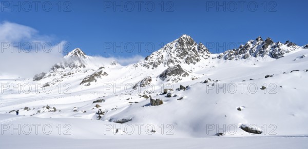 Picturesque snow-covered mountain landscape with peaks, ascent to the summit of Kesch Pitschen, Bündner Haute Route ski tour, Albula Alps, Rhaetian Alps, Grisons, Eastern Switzerland, Switzerland, Europe