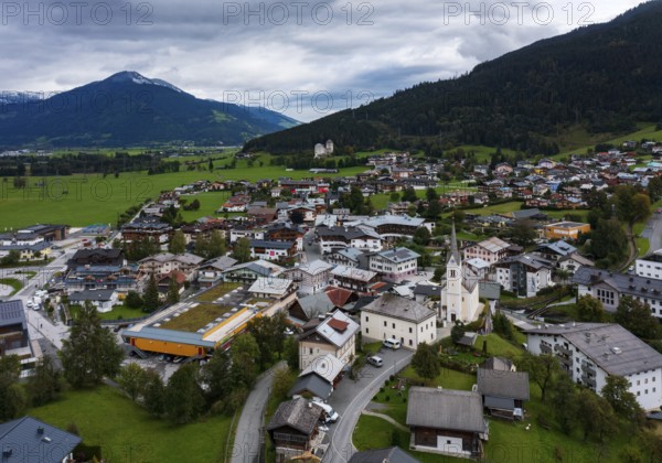Drone image, residential buildings, view of village with parish church, Kaprun, Pinzgau, Salzburg province, Austria, Europe