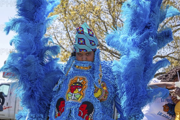 New Orleans, Louisiana - The Mardi Gras Indians' Super Sunday parade. African-Americans create elaborate costumes for the annual event to honor Native Americans who, during slavery, helped helped people escape and gave them refuge