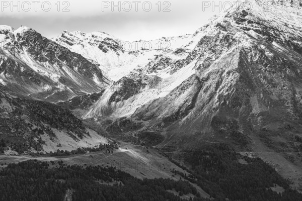 Dark clouds over the snow-covered mountains, black and white photo, above Saint Luc, Val d'Anniviers, Valais Alps, Canton Valais, Switzerland, Europe