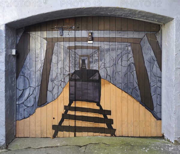 Painted garage door as a gallery with mine car, mining past, nostalgia, Goslar, Lower Saxony, Germany, Europe