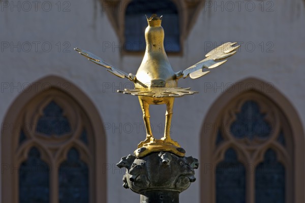 Gilded imperial eagle as a fountain eagle on the market fountain in front of the town hall, Old Town, Goslar, UNESCO World Heritage Site, Lower Saxony, Germany, Europe