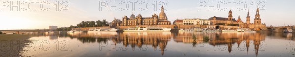Panorama of the city skyline with reflection in the Elbe, Carola Bridge, Brühl's Terrace, Academy of Fine Arts, Church of Our Lady, Secondary School, Ständehaus, Georgentor, Hausmannsturm, Court Church and Augustus Bridge in the morning light, Dresden, Saxony, Germany, Europe