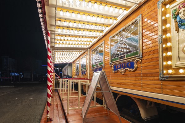 Illuminated wooden checkout area in evening light, Böblingen, Germany, Europe