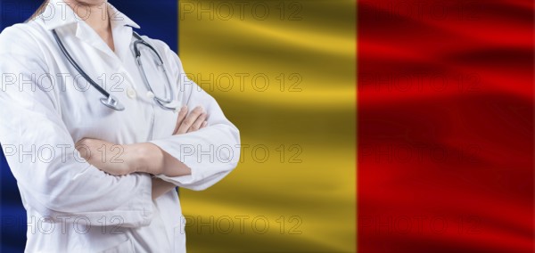 Doctor with crossed arms on Romanian flag. Romania health and care concept. Female doctor on Romanian flag