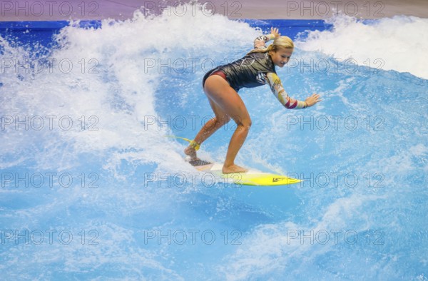 Messe boot Düsseldorf, Surfer riding a standing indoor wave on the occasion of a press event, Düsseldorf, North Rhine-Westphalia, Germany, Europe