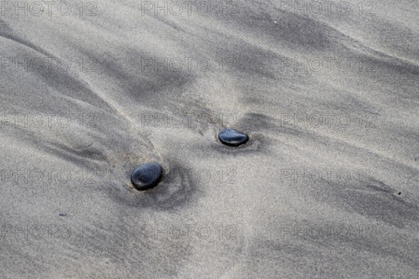 Polished lava stones on the beach, Playa de Famara, Lanzarote, Canary Islands, Spain, Europe