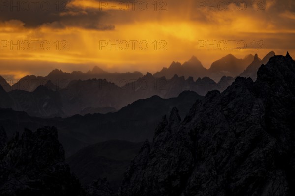 Montafon mountains with dramatic cloudy sky at sunrise, Tschagguns, Rätikon, Montafon, Vorarlberg, Austria, Europe