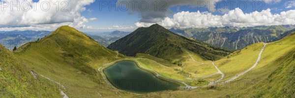 Riezler Alpsee, an artificial lake, snow pond, feeds the snow cannons that provide complete snow cover for the Fellhorn and Kanzelwand cable car slopes, Fellhorn behind, 2038m, Allgäu Alps, Bavaria, Germany, Europe