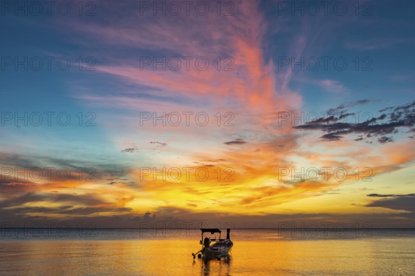 Longtail boat in sunset, sunset, horizon, evening light, boat, sun, evening mood, cloudy sky, colourful, orange, wooden boat, sea, calm, tranquillity, emotion, journey, holiday, beach, tourism, holiday mood, holiday paradise, paradise, evening sky, romantic, cloud, sky, dream holiday, coast, wanderlust, seascape, seascape, serenity, mood, symbolic, dusk, silhouette, light, weather, climate, Thailand, Asia