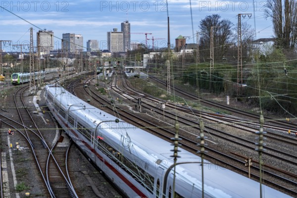Train on the tracks west of Essen central station, skyline of the city centre, ICE train, North Rhine-Westphalia, Germany, Europe