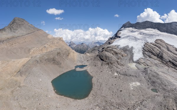 Panorama aerial view of glacial lake, SAC hut monte leone, near Simplon mountain pass, Switzerland, Europe