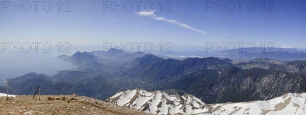 View of the Turkish Riviera from the snow-covered Tahtali Dagi, Turkey, Asia
