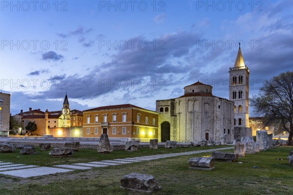 The Church of St Donatus, remains of the Roman forum and the bell tower of Zadar Cathedral at dusk, Croatia, Europe