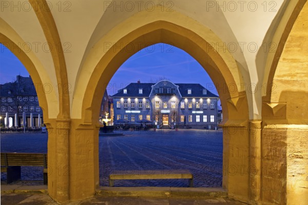 View from the open hall of the late Gothic town hall in Goslar in the evening onto the market square with the Kaiserringhaus, UNESCO World Heritage Site, Lower Saxony, Germany, Europe