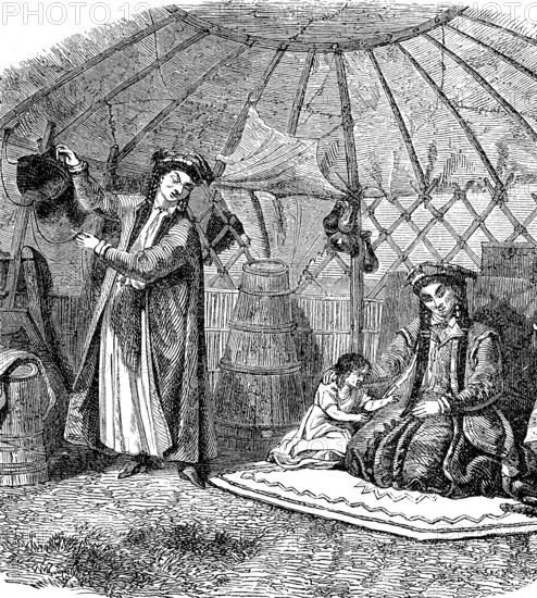 Family in a yurt in Mongolia, in 1870, Historical, digital reproduction of an original from the 19th century
