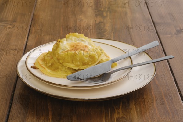 Portion of fried apple pancakes on a plate