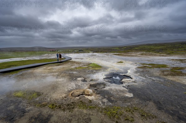 Tourists on a logging road between hot springs, Hveravellir geothermal area, Icelandic Highlands, Suðurland, Iceland, Europe