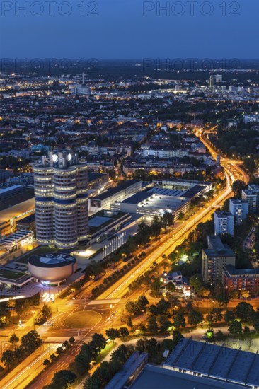 MUNICH, GERMANY, MAY 11: Aerial view of BMW Museum & BWM Welt & factory from Olympic Tower in the evening on May 11, 2012 in Munich, Bavaria, Germany. BMW is famous German luxury car automaker
