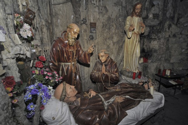 Interior of the Grotto of St Anthony of Padua, Saint-Antoine de Padoue showing praying monks at deathbed, Crupet, Namur, Belgian Ardennes, Belgium, Europe