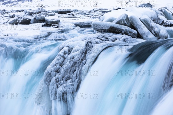 Godafoss waterfall, icy and snowy rock face, Northern Iceland Eyestra, Iceland, Europe