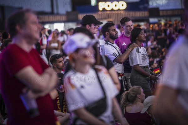Scenes in the fan zone on Platz der Republik in front of the Reichstag building taken in Berlin, 29 June 2024 during the broadcast of the football match between Denmark and Germany