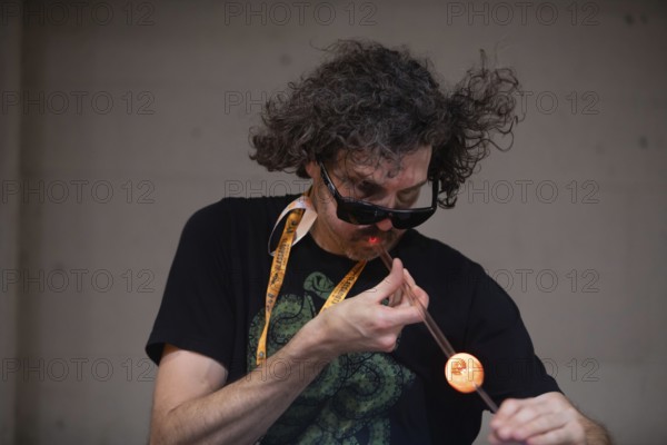 Detroit, Michigan, Artists create glass and other artworks at the Michigan Glass Project's annual show. The event raises money to support art education in Detroit-area schools