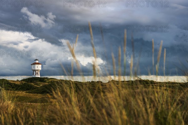 Water tower, clouds, weather, gloomy, cloudy, cloudy sky, storm, stormy, dune landscape, North Sea island, Langeoog, Germany, Europe