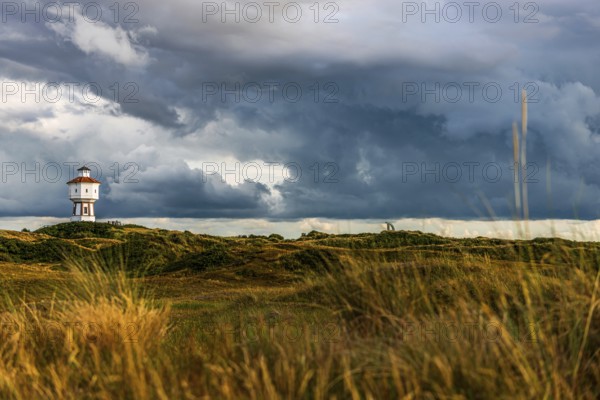 Water tower, clouds, weather, gloomy, cloudy, cloudy sky, storm, stormy, dune landscape, North Sea island, Langeoog, Germany, Europe
