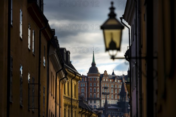 Houses in an alley of Gamla Stan, old town, centre, attraction, famous, city centre, city trip, tourism, travel, holiday, architecture, historical, UNESCO, world heritage, evening, culture, history, city history, medieval, urban, Stockholm, Sweden, Scandinavia, Europe