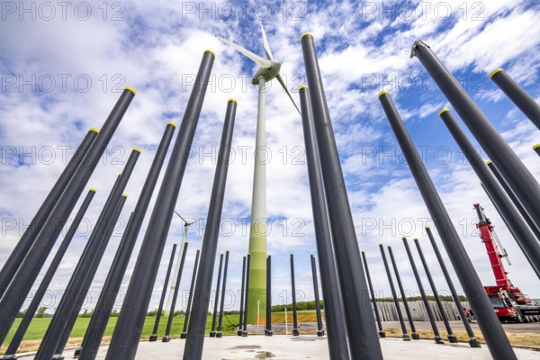Wind turbine repowering, in the Issum-Oermten wind farm, 9 wind turbines in operation for over 20 years (Enercon model series E-58) in the background are replaced by 4 new turbines (type Enercon E-160), foundation, which then generate 4 times more electricity than the old 9 wind turbines, North Rhine-Westphalia, Germany, Europe