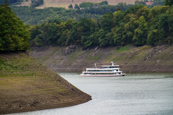 The Edersee, near Waldeck, the third largest reservoir in Germany, currently has only just under 13% of its normal level, the lake was last full in May 2022, dried up due to lack of rain, excursion boat Edersee Star, the water level is a good 25 metres below the normal level, Hesse, Germany, Europe