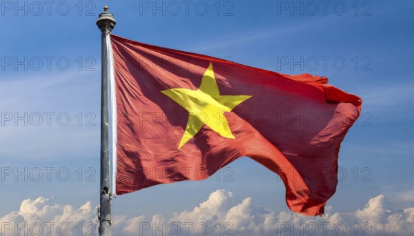 Flags, the national flag of Vietnam flutters in the wind