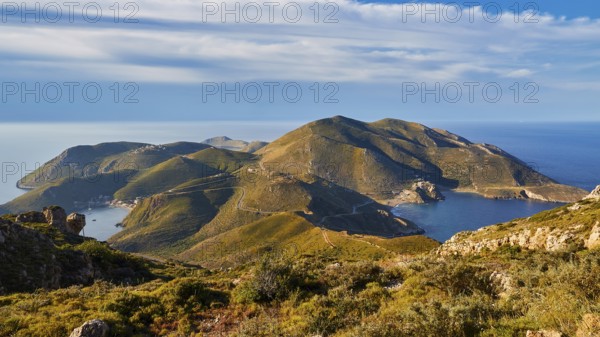 A clear picture of a bay with mountainous surroundings and blue sky on the coast, southern tip, Mani peninsula, Peloponnese, Greece, Europe