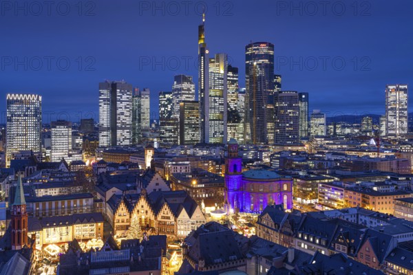 St Paul's Church in Frankfurt am Main will be illuminated in blue in the middle of the Christmas market on 10 December 2024, International Human Rights Day. This commemorates the declaration of the UN Human Rights Charter of 10 December 1948. Frankfurt am Main, Römerberg, Hesse, Germany, Europe