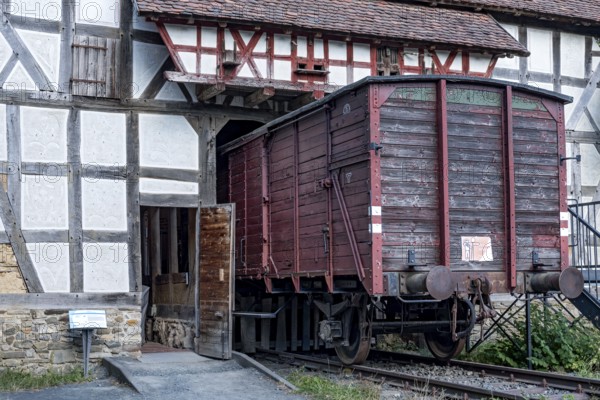 Goods wagon as used for deportations to concentration camps and military transports under National Socialism, exhibition Flight and Expulsion, barn from Damshausen, Hessenpark Open-Air Museum, Neu-Anspach, Taunus, Hesse, Germany, Europe