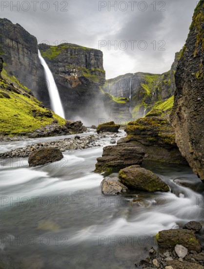 Haifoss and Granni waterfall at a canyon, Fossá í Þjórsárdal, with river í Þjórsárdal, long exposure, dramatic landscape, Hekla, Iceland, Europe