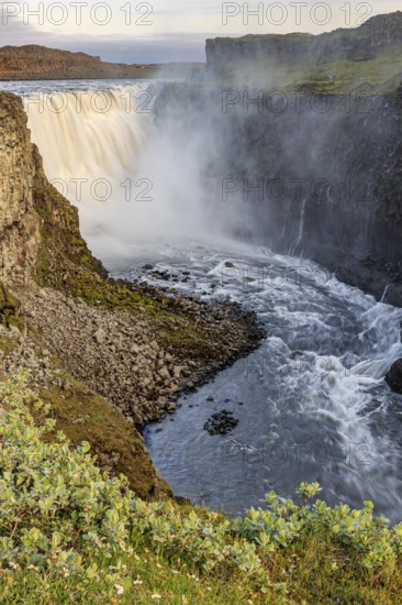Large waterfall in a gorge, spray, rapids, summer, midnight sun, Dettifoss, North Iceland, Iceland, Europe