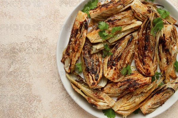 Baked, oven-baked fennel, with spices, in olive oil, homemade, no people