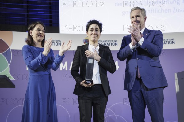 Annalena Bärbock (Alliance 90/The Greens), Federal Foreign Minister, Dunja Hayali, journalist and TV presenter, and Christian Wulff, former Federal President and Chairman of the DSI Foundation Board, photographed at the DSI Talisman Award ceremony in Berlin, 12 March 2024. With the Talisman Award, the Deutschlandstiftung Integration honours people who have rendered outstanding services to the cohesion of our society through their commitment. Photographed on behalf of the Federal Foreign Office